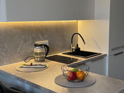 Η κουζίνα ή μικρή κουζίνα στο Avia Loft