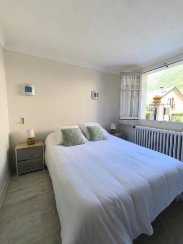 Postel nebo postele na pokoji v ubytování Appartement 4 pers, 2 chambres, en RDC d'une maison, à Luz Saint Sauveur, Hautes-Pyrénées