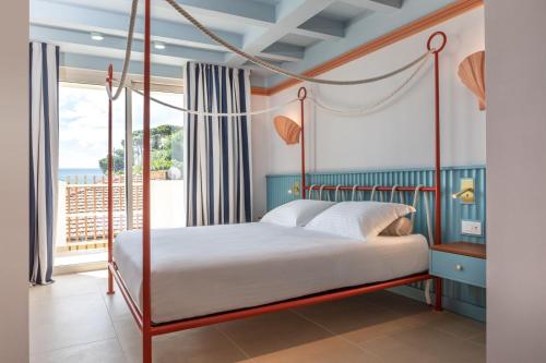 Postel nebo postele na pokoji v ubytování Murè Hotel Numana