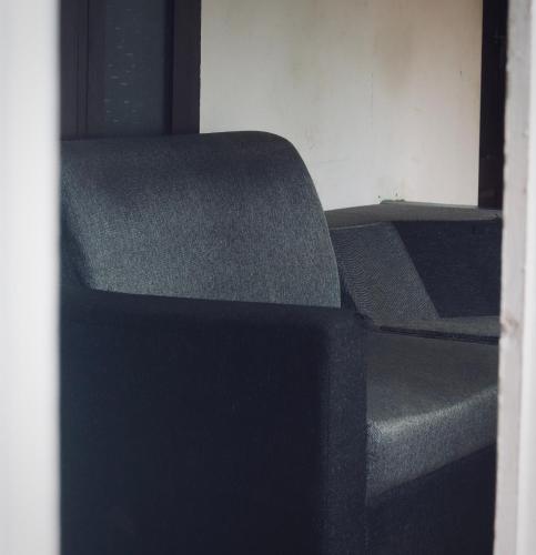 a stack of chairs sitting in a room at Paradise Inn Beach Resort in Varkala