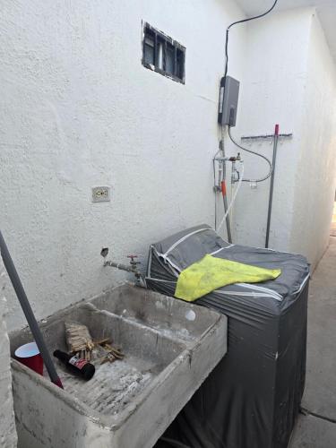 a room with a sink in a room at De la llanura 31 in Hermosillo