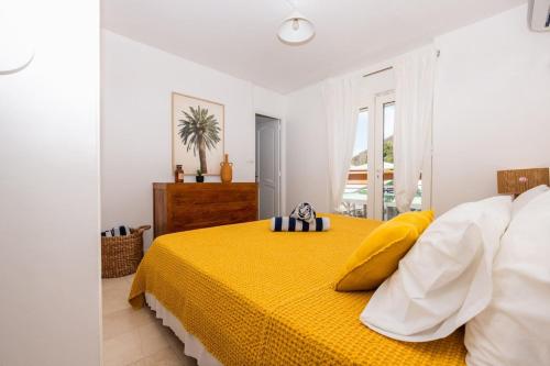 Un ou plusieurs lits dans un hébergement de l'établissement Beachfront Apartment Flamant Grand Case