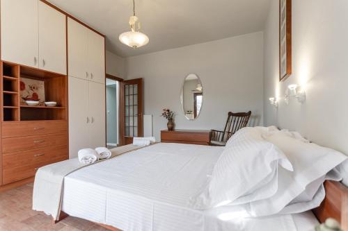 Ένα ή περισσότερα κρεβάτια σε δωμάτιο στο Melanes Serenity 3Br Apartment