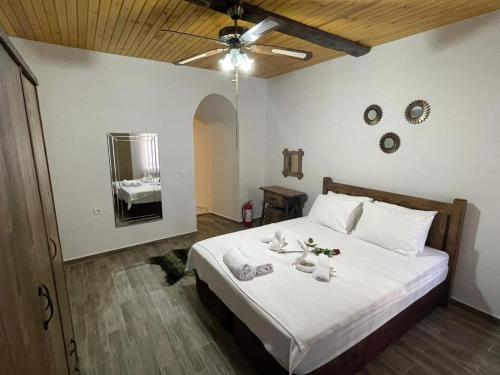 Postel nebo postele na pokoji v ubytování Hacımemiş Alaçatı Home