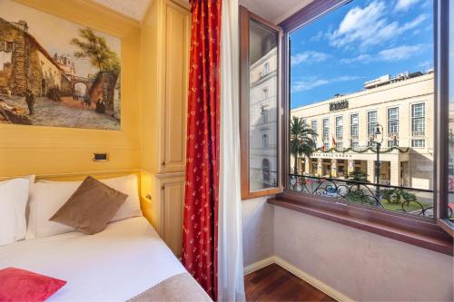 Posteľ alebo postele v izbe v ubytovaní Al Viminale Hill Inn & Hotel