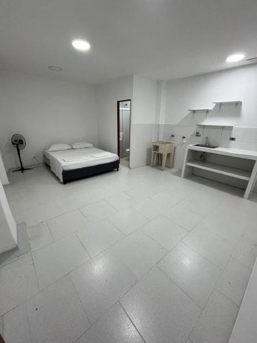 Postel nebo postele na pokoji v ubytování Hospedaje - Casa Alameda