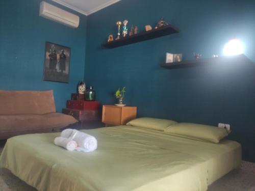 Ένα ή περισσότερα κρεβάτια σε δωμάτιο στο Casa grande, céntrica y con garaje