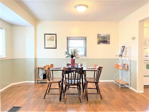 a dining room with a table and chairs at High - Family Neighborhood, Pet Friendly in Van Wert