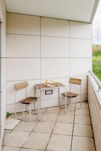 Posezení v ubytování Elegant Riverfront Flat | Pool & Sports by Host Wise