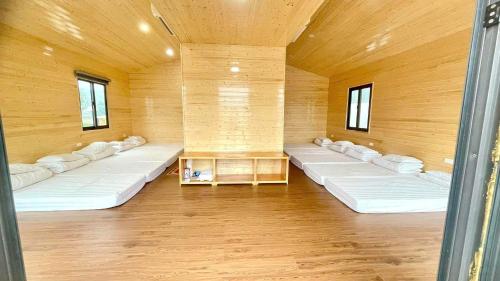 Ένα ή περισσότερα κρεβάτια σε δωμάτιο στο Homestay Gió Mộc