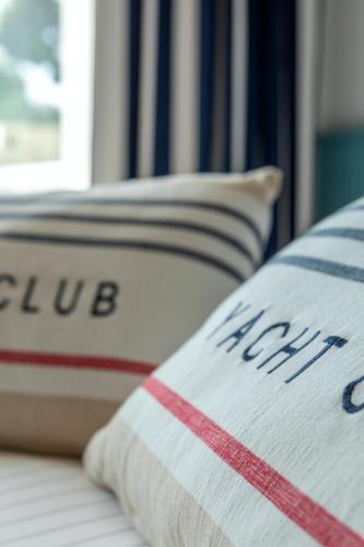 a close up of a pillow on a bed at Murè Hotel Numana in Numana