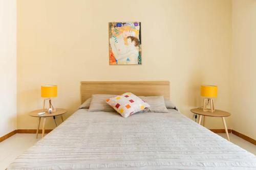 Ένα ή περισσότερα κρεβάτια σε δωμάτιο στο Villa Vintage 8 posti "Emozioni del passato"