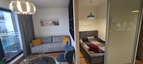 Χώρος καθιστικού στο Apartament 33 przy latarni