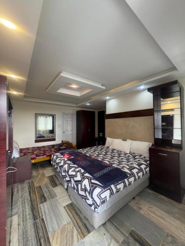 Postel nebo postele na pokoji v ubytování Summer Dreams Cottage Kodaikanal
