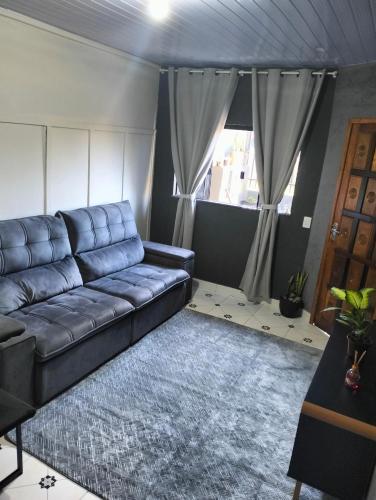 Posezení v ubytování Casa aconchegante para hóspedes ao lado da 466 e Cidade dos Lagos