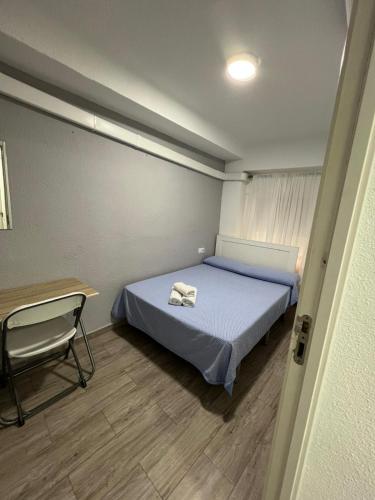 Katil atau katil-katil dalam bilik di Guesthouse Central