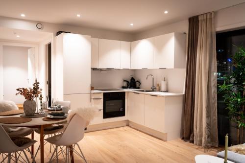 Køkken eller tekøkken på Moderne leilighet ved sjøkanten