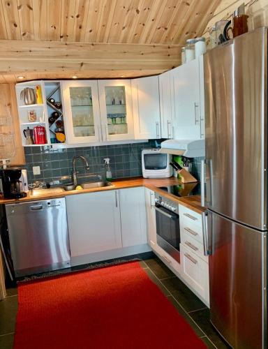Η κουζίνα ή μικρή κουζίνα στο Cosy family cabin in Trysil