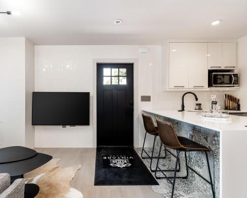a kitchen with a black door and a black counter at Unmatched Privacy & Luxury for the Entire Family in Bozeman
