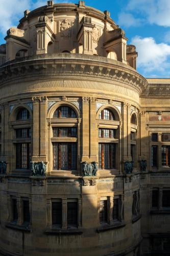a large building with a lot of windows at Palazzo Doni by Florence Art Apartments in Florence