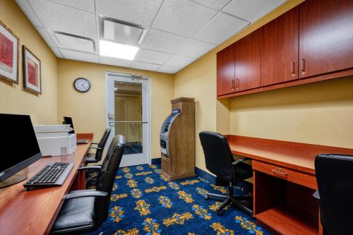 an office with a desk with a computer and chairs at Hampton Inn & Suites Providence Downtown in Providence