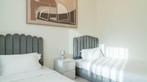 Postel nebo postele na pokoji v ubytování F1 Dream 4br Villa! - Yas Island