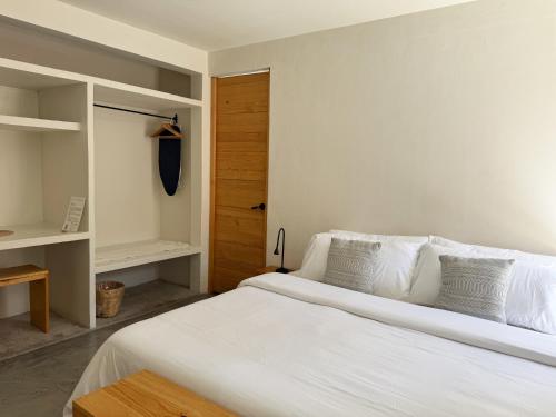 Postel nebo postele na pokoji v ubytování Casa 821 Guest House