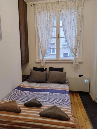 Llit o llits en una habitació de Tiny studio in top center