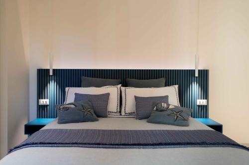 Ένα ή περισσότερα κρεβάτια σε δωμάτιο στο Casa Vacanze Angiolina-Suite W Private Box Auto