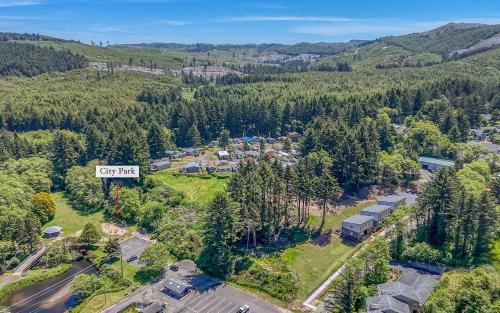 an aerial view of a town in the mountains at Harbor Lights 2 Family Fun Retreat Coastal Comfort in Depoe Bay