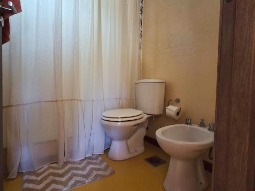 Ein Badezimmer in der Unterkunft El Reencanto