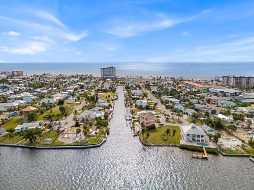 an aerial view of a city with a harbor at Boating Enthusiasts, Walk to the Beach, Heated Pool - The Corner cottage - Roelens in Fort Myers Beach