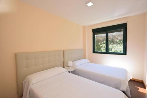 Postel nebo postele na pokoji v ubytování Apartmento Mar O Pindo