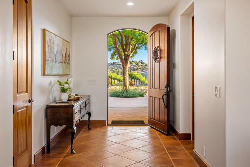 an entryway with a door leading to a yard at Krisyn Vineyards in Templeton