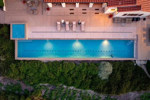 an overhead view of a large swimming pool at Krisyn Vineyards in Templeton