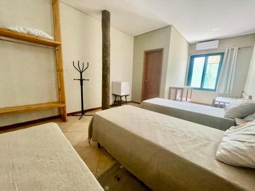 Postel nebo postele na pokoji v ubytování Pousada Verde Perto - Demétria