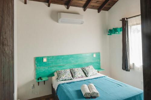 Postel nebo postele na pokoji v ubytování Casa completa no segundo andar