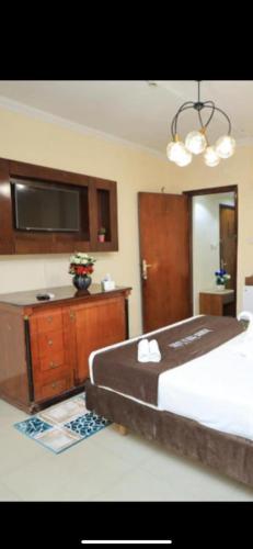 Una cama o camas en una habitación de Dreamers Hotel