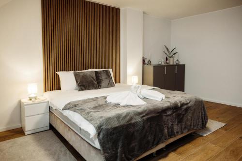 Postel nebo postele na pokoji v ubytování Apartman Nina