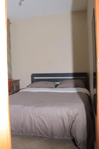 Postel nebo postele na pokoji v ubytování The Parenos