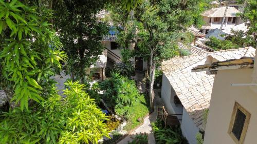 Κήπος έξω από το Hotel Pousada Coqueiros