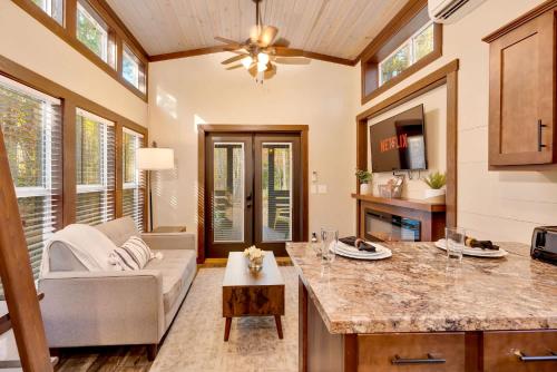 a kitchen and living room with a couch and a table at Black Diamond at Mentone with Free Internet in Menlo