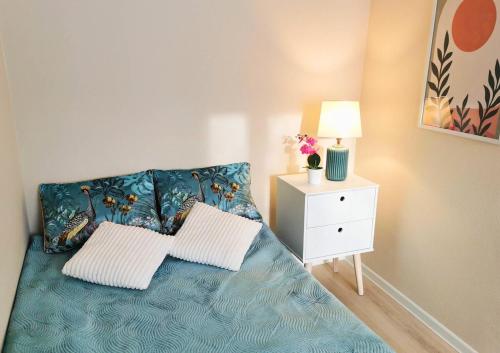 Postel nebo postele na pokoji v ubytování Modern Studio Apartment