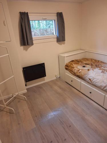 Ein Bett oder Betten in einem Zimmer der Unterkunft Sakurahuisje