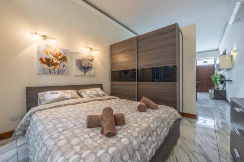 Postel nebo postele na pokoji v ubytování Seafront apartment in Ta'Xbiex