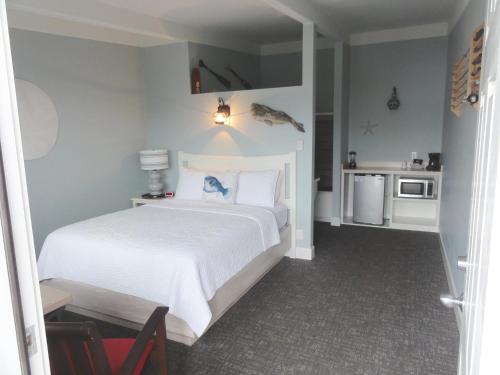 Ένα ή περισσότερα κρεβάτια σε δωμάτιο στο Harborview Inn & RV Park