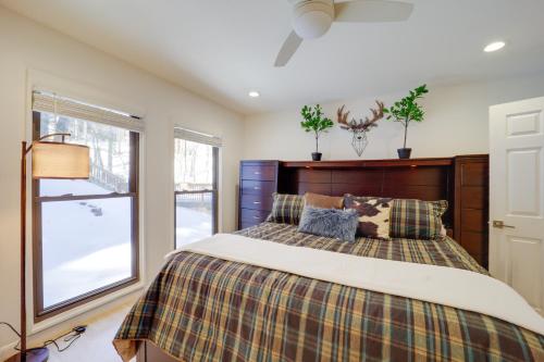 a bedroom with a bed and a window at Ski, Hike & More! Couple's Getaway in Beech Mtn in Beech Mountain