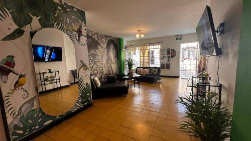 Μια τηλεόραση ή/και κέντρο ψυχαγωγίας στο Hostal Mi Casa 18 JJ