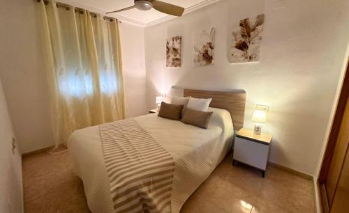 Giường trong phòng chung tại El Molino 9 Bonito Apartamento en la Ciudad