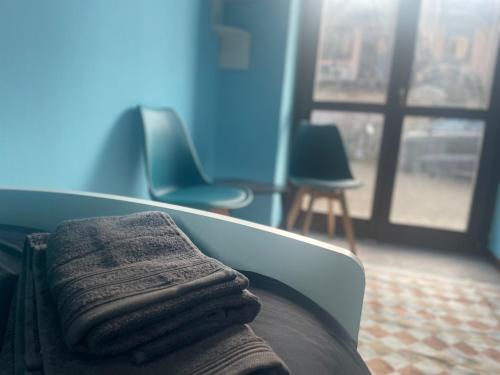 Кровать или кровати в номере Room Malpensa 7- Servizio Taxi MXP 25 Euro